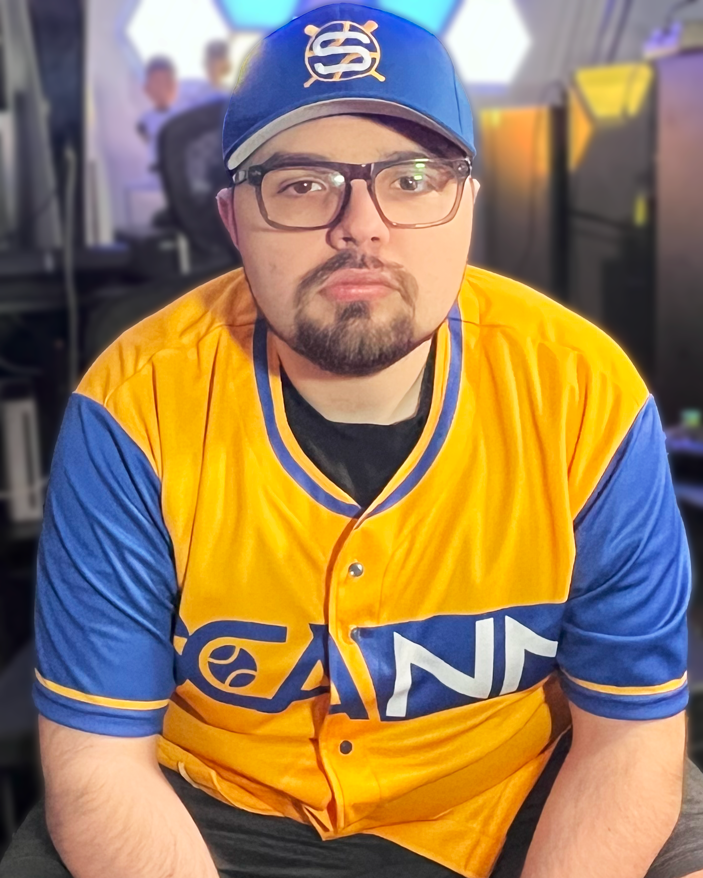 Scann wearing a Royal Blue fitted FlexFit hat