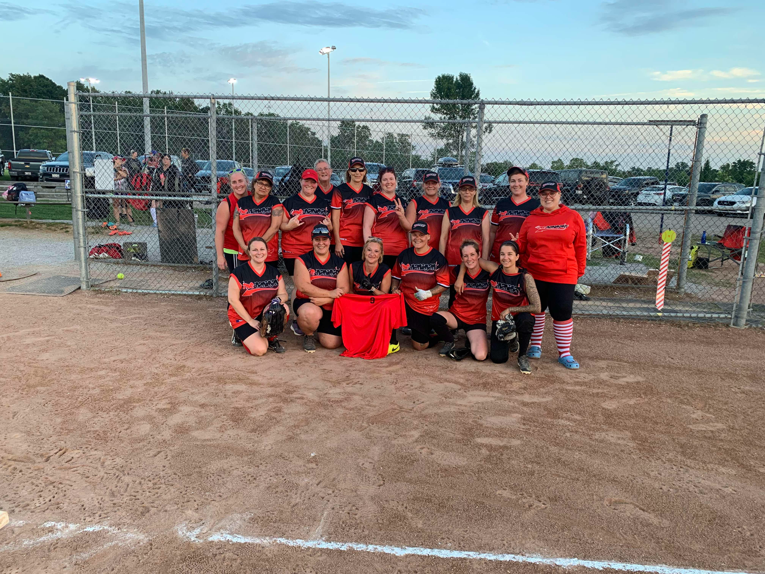 red sleeveless slo-pitch jerseys