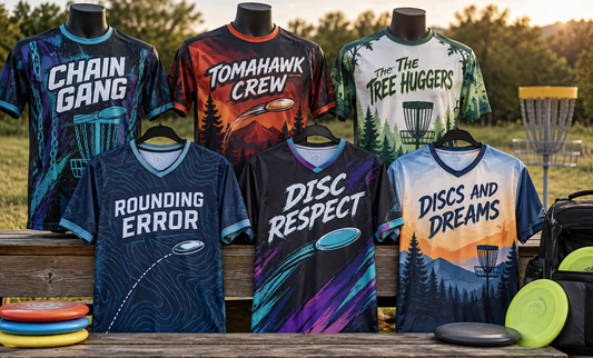 Six custom disc golf jerseys on mannequins with discs, a bag and a basket