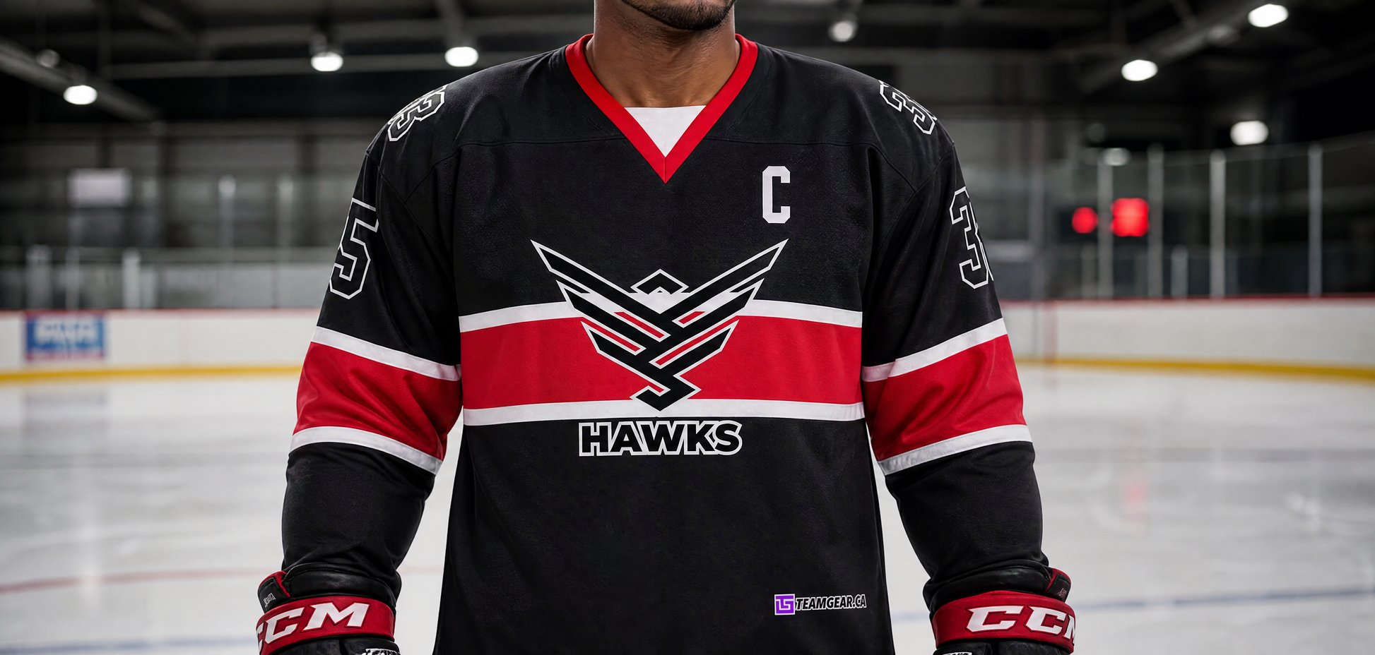 Black Hawks Hockey Jersey — custom hockey jersey worn on model — TeamGear Canada