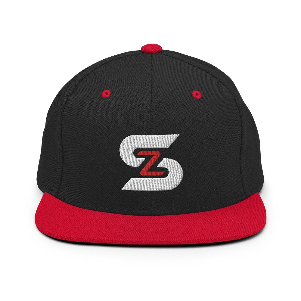 ShowZone snapback hat in black with red brim and accents