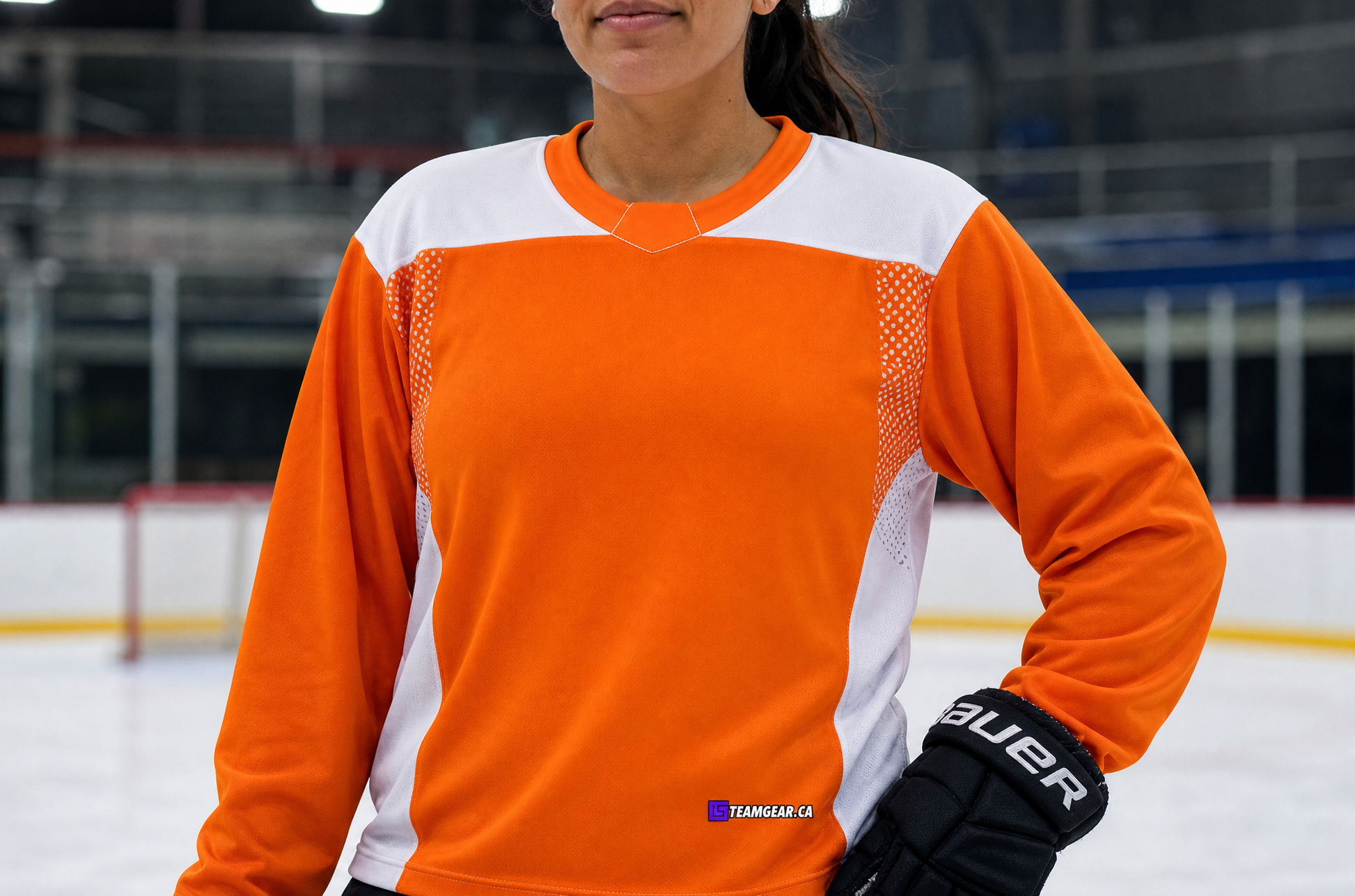 Hockey Practice Jersey Orange — custom hockey jersey worn on model — TeamGear Canada