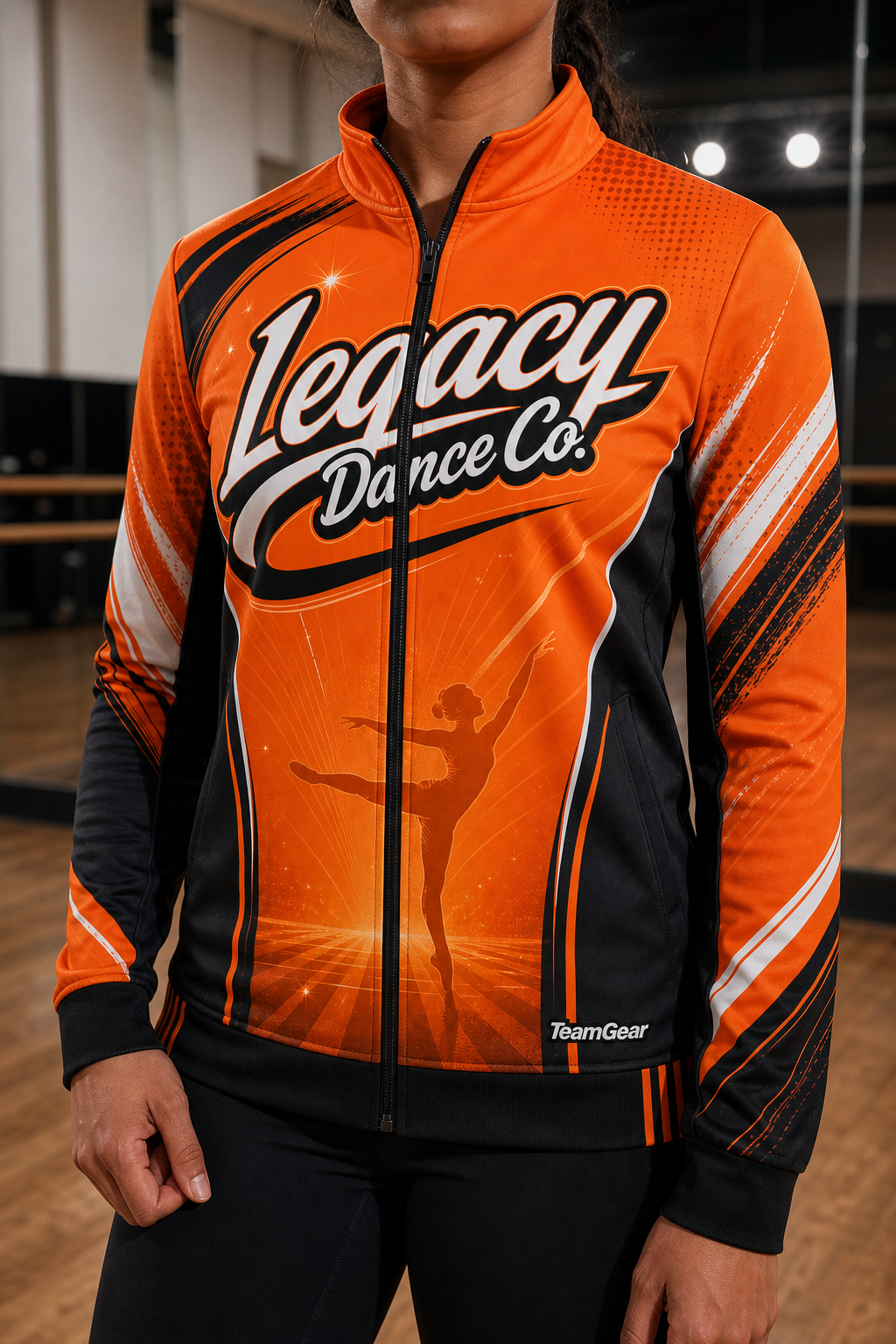 Legacy Dance Co. Orange Dance Jacket — custom dance jacket worn on model — TeamGear Canada