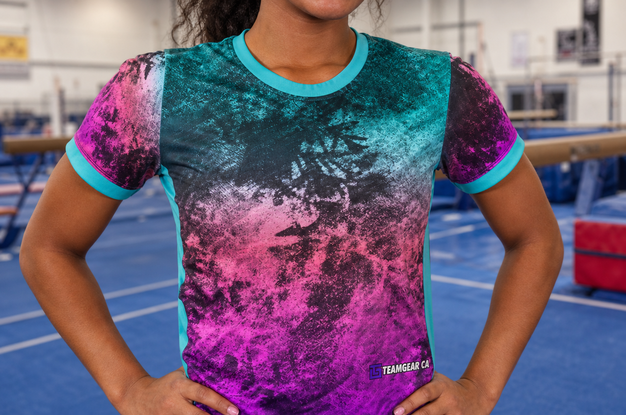 Pink and Teal Warmup Gymnastics Jersey — custom gymnastics jersey worn on model — TeamGear Canada
