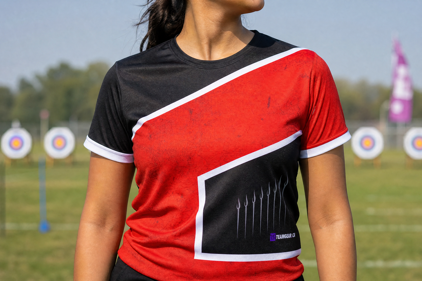 Red Arrow Archery Jersey — custom archery jersey worn on model — TeamGear Canada