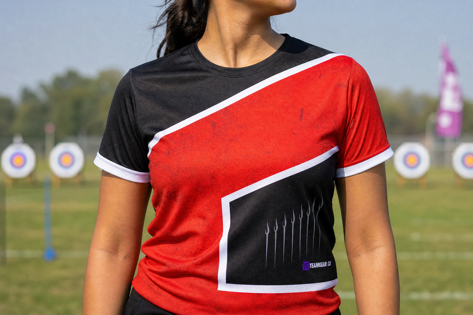Red Arrow Archery Jersey — custom archery jersey worn on model — TeamGear Canada