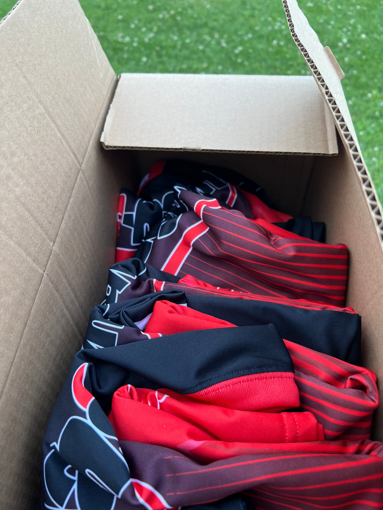 red custom jerseys shipped by TeamGear Canada